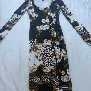 Elegant Black and Gold Patterned Dress